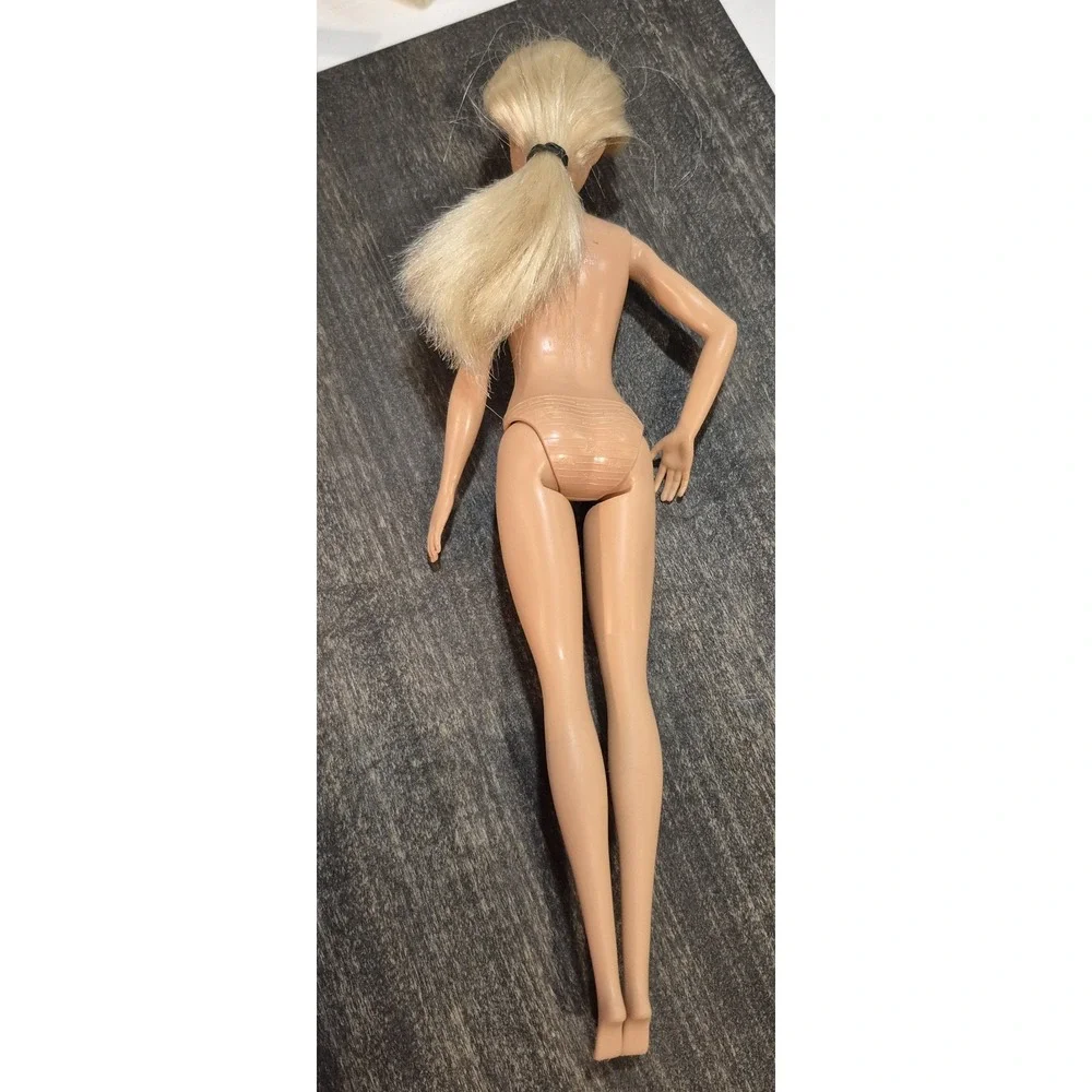 Mattel Barbie Fashionistas doll with a platinum‎ blonde ponytail & Articulated